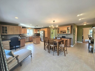 Immaculate Polo Fields home with first-floor primary suite and on Polo Fields Golf and Country Club in Michigan - for sale on GolfHomes.com, golf home, golf lot