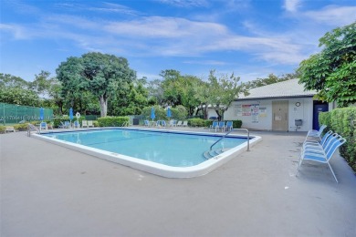 This stunning 2-bedroom unit has been entirely redone and is on Inverrary Country Club in Florida - for sale on GolfHomes.com, golf home, golf lot