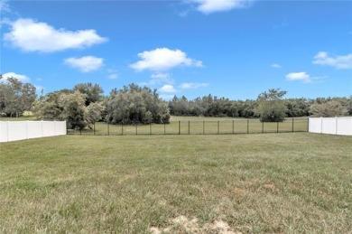 2021 CONCRETE BLOCK STUCCO BUILT HOME WITH 6 FOOT VINYL FENCED on Marion Oaks Country Club in Florida - for sale on GolfHomes.com, golf home, golf lot