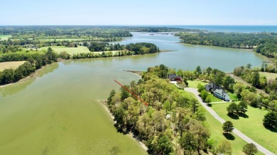 This exceptional creekfront homesite is situated in the on Bay Creek Golf Club in Virginia - for sale on GolfHomes.com, golf home, golf lot