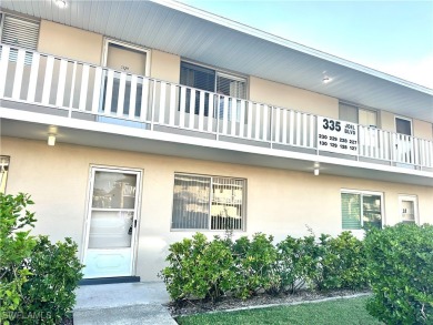 This open and bright 2 bedroom, 2 full bath condo is close to on Lehigh Resort Club in Florida - for sale on GolfHomes.com, golf home, golf lot