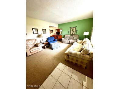 This open and bright 2 bedroom, 2 full bath condo is close to on Lehigh Resort Club in Florida - for sale on GolfHomes.com, golf home, golf lot