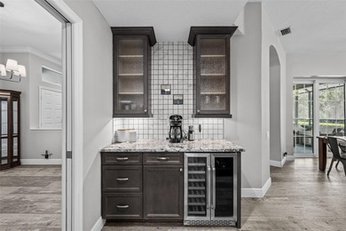 Step into this meticulously upgraded 3-bedroom, 2-bathroom gem on Silverthorn Country Club in Florida - for sale on GolfHomes.com, golf home, golf lot