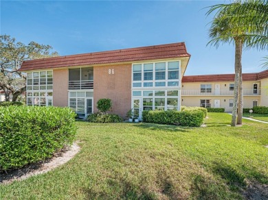 Waterfront condo - First floor 2BR, 2BA with amazing view of on The American Golf Club in Florida - for sale on GolfHomes.com, golf home, golf lot