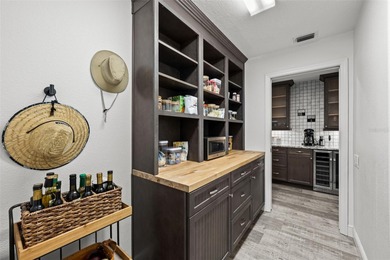 Step into this meticulously upgraded 3-bedroom, 2-bathroom gem on Silverthorn Country Club in Florida - for sale on GolfHomes.com, golf home, golf lot