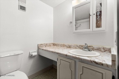 Welcome to an incredible opportunity to own an affordable on Daytona Beach Golf Club in Florida - for sale on GolfHomes.com, golf home, golf lot