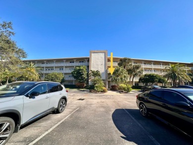 2/2 CONDO NESTLED ON THE WATER WITH LIGHTED FOUNTAIN GOLF VIEWS! on Wynmoor Golf Course in Florida - for sale on GolfHomes.com, golf home, golf lot