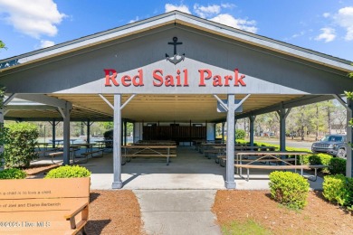 Enjoy stunning water views from nearly every room in this on Harbour Point Golf Club in North Carolina - for sale on GolfHomes.com, golf home, golf lot