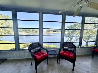 2/2 CONDO NESTLED ON THE WATER WITH LIGHTED FOUNTAIN GOLF VIEWS! on Wynmoor Golf Course in Florida - for sale on GolfHomes.com, golf home, golf lot