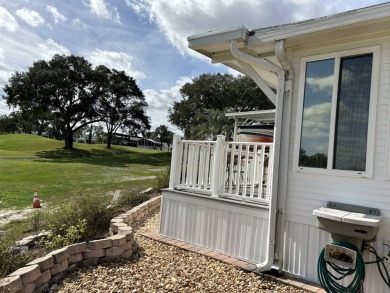 Spacious Park Model with front porch and bonus room in back on Deer Creek RV Golf Resort in Florida - for sale on GolfHomes.com, golf home, golf lot