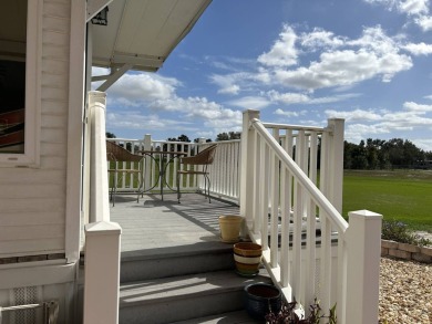 Spacious Park Model with front porch and bonus room in back on Deer Creek RV Golf Resort in Florida - for sale on GolfHomes.com, golf home, golf lot