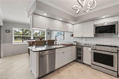 Charming, stately, end-unit with a spectacular view of the on The Forest Country Club in Florida - for sale on GolfHomes.com, golf home, golf lot