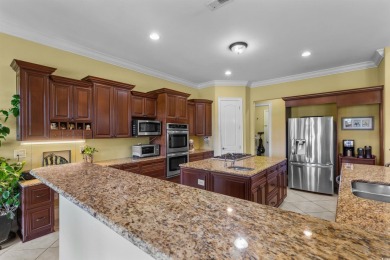 This beautiful home sits on a large lakefront lot in the Milano on Grande Dunes Golf Club in South Carolina - for sale on GolfHomes.com, golf home, golf lot