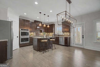 Better Than Brand New! This gorgeous home with Owner's Suite on on Traditions of Braselton Golf Club in Georgia - for sale on GolfHomes.com, golf home, golf lot