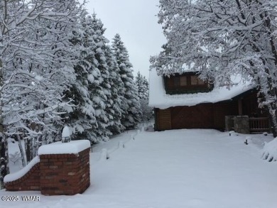 Nestled in the serene beauty of Pinetop Country Club, this on Pinetop Lakes Country Club in Arizona - for sale on GolfHomes.com, golf home, golf lot
