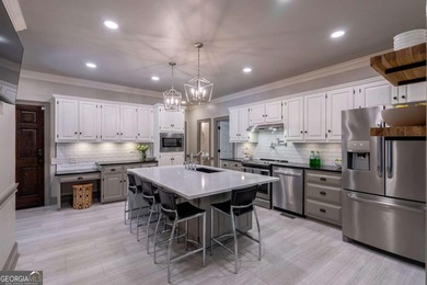 Welcome to 1291 Millstone Run, a stunning four bedroom, four on Jennings Mill Country Club in Georgia - for sale on GolfHomes.com, golf home, golf lot