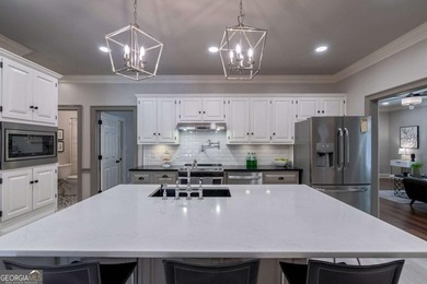 Welcome to 1291 Millstone Run, a stunning four bedroom, four on Jennings Mill Country Club in Georgia - for sale on GolfHomes.com, golf home, golf lot