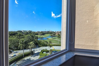 Indulge in the epitome of waterfront luxury living in this on Boca Raton Resort and Club in Florida - for sale on GolfHomes.com, golf home, golf lot