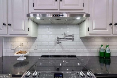 Welcome to 1291 Millstone Run, a stunning four bedroom, four on Jennings Mill Country Club in Georgia - for sale on GolfHomes.com, golf home, golf lot