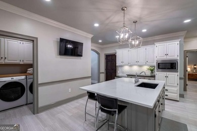 Welcome to 1291 Millstone Run, a stunning four bedroom, four on Jennings Mill Country Club in Georgia - for sale on GolfHomes.com, golf home, golf lot