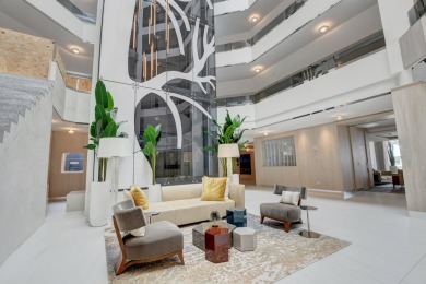 Indulge in the epitome of waterfront luxury living in this on Boca Raton Resort and Club in Florida - for sale on GolfHomes.com, golf home, golf lot
