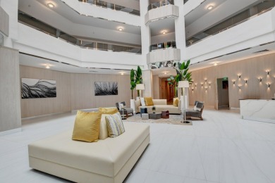 Indulge in the epitome of waterfront luxury living in this on Boca Raton Resort and Club in Florida - for sale on GolfHomes.com, golf home, golf lot