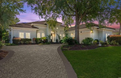 This beautiful home sits on a large lakefront lot in the Milano on Grande Dunes Golf Club in South Carolina - for sale on GolfHomes.com, golf home, golf lot