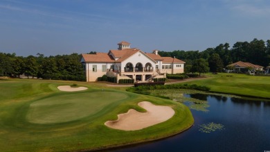 This beautiful home sits on a large lakefront lot in the Milano on Grande Dunes Golf Club in South Carolina - for sale on GolfHomes.com, golf home, golf lot