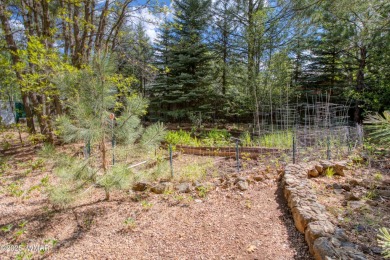Nestled in the serene beauty of Pinetop Country Club, this on Pinetop Lakes Country Club in Arizona - for sale on GolfHomes.com, golf home, golf lot