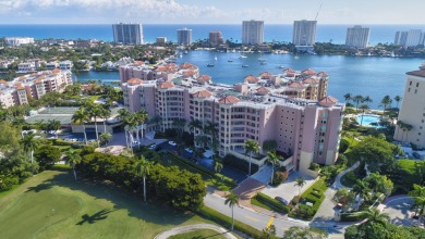 Indulge in the epitome of waterfront luxury living in this on Boca Raton Resort and Club in Florida - for sale on GolfHomes.com, golf home, golf lot
