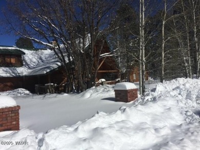 Nestled in the serene beauty of Pinetop Country Club, this on Pinetop Lakes Country Club in Arizona - for sale on GolfHomes.com, golf home, golf lot