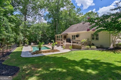 Welcome to 1291 Millstone Run, a stunning four bedroom, four on Jennings Mill Country Club in Georgia - for sale on GolfHomes.com, golf home, golf lot