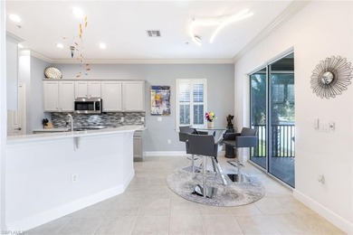 Luxury turnkey coach home overlooking the golf course in the on The Golf Lodge At the Quarry in Florida - for sale on GolfHomes.com, golf home, golf lot