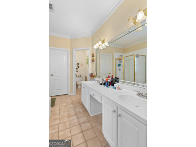 Welcome to this stately 4 bedroom, 2.5 bathroom traditional on Canongate At Georgia National Golf Club in Georgia - for sale on GolfHomes.com, golf home, golf lot