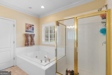 Welcome to this stately 4 bedroom, 2.5 bathroom traditional on Canongate At Georgia National Golf Club in Georgia - for sale on GolfHomes.com, golf home, golf lot
