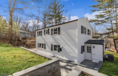 This Newly Renovated modern Colonial home in Sparta New Jersey on Lake Mohawk Golf Club in New Jersey - for sale on GolfHomes.com, golf home, golf lot