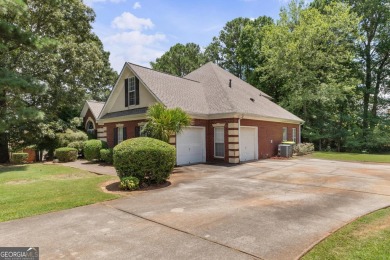 Welcome to this stately 4 bedroom, 2.5 bathroom traditional on Canongate At Georgia National Golf Club in Georgia - for sale on GolfHomes.com, golf home, golf lot