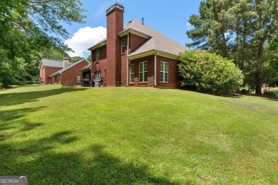 Welcome to this stately 4 bedroom, 2.5 bathroom traditional on Canongate At Georgia National Golf Club in Georgia - for sale on GolfHomes.com, golf home, golf lot