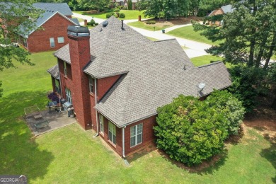 Welcome to this stately 4 bedroom, 2.5 bathroom traditional on Canongate At Georgia National Golf Club in Georgia - for sale on GolfHomes.com, golf home, golf lot