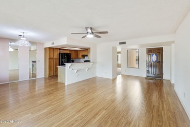 Step into desert charm and serene community living in this on Fountain of the Sun Country Club in Arizona - for sale on GolfHomes.com, golf home, golf lot