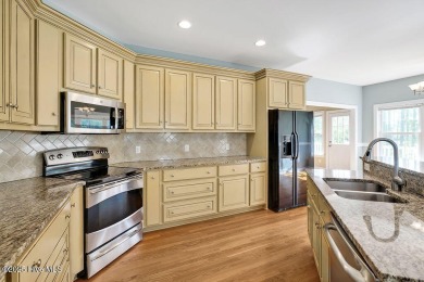This thoughtfully designed home offers tranquil views of the on Members Club At St. James Plantation in North Carolina - for sale on GolfHomes.com, golf home, golf lot