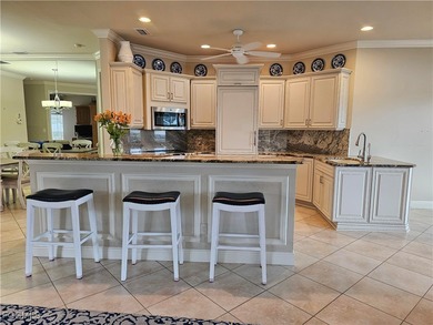 GOLF COURSE & WATERFRONT VIEWS! Welcome to this beautifully on Estero Country Club in Florida - for sale on GolfHomes.com, golf home, golf lot