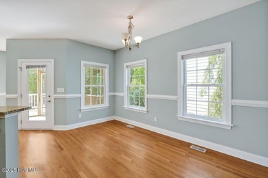 This thoughtfully designed home offers tranquil views of the on Members Club At St. James Plantation in North Carolina - for sale on GolfHomes.com, golf home, golf lot