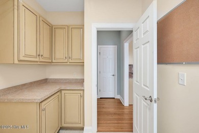 This thoughtfully designed home offers tranquil views of the on Members Club At St. James Plantation in North Carolina - for sale on GolfHomes.com, golf home, golf lot