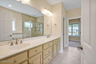 This thoughtfully designed home offers tranquil views of the on Members Club At St. James Plantation in North Carolina - for sale on GolfHomes.com, golf home, golf lot