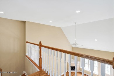 This thoughtfully designed home offers tranquil views of the on Members Club At St. James Plantation in North Carolina - for sale on GolfHomes.com, golf home, golf lot