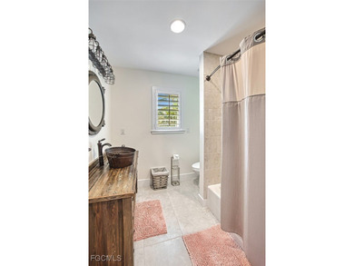 Discover this one-of-a-kind beach home that captures the true on Beachview Golf Club in Florida - for sale on GolfHomes.com, golf home, golf lot