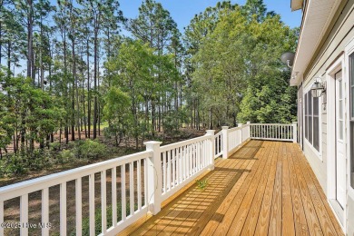 This thoughtfully designed home offers tranquil views of the on Members Club At St. James Plantation in North Carolina - for sale on GolfHomes.com, golf home, golf lot