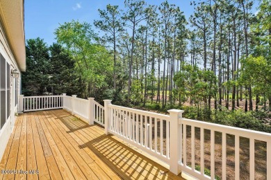 This thoughtfully designed home offers tranquil views of the on Members Club At St. James Plantation in North Carolina - for sale on GolfHomes.com, golf home, golf lot