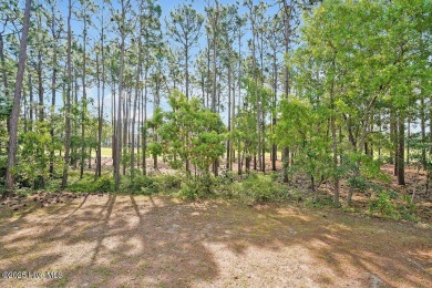 This thoughtfully designed home offers tranquil views of the on Members Club At St. James Plantation in North Carolina - for sale on GolfHomes.com, golf home, golf lot